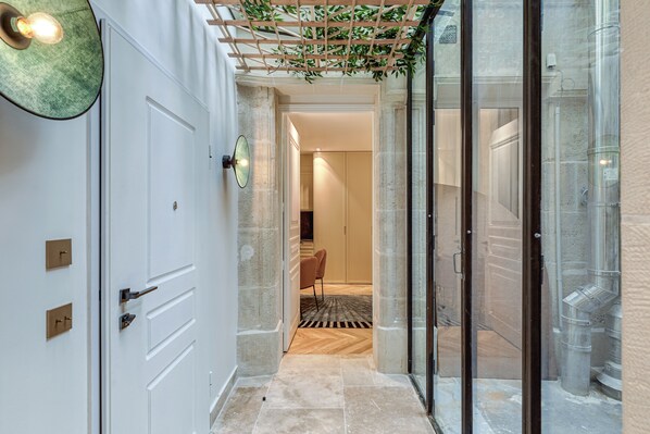 Apartamento superior | Zona de estar | Una Smart TV, una impresora