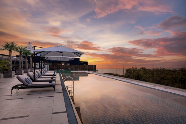 Outdoor pool, pool umbrellas, pool loungers