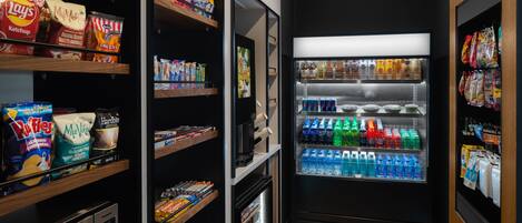 A vending machine area with snacks and drinks.