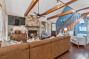 Smart TV, fireplace, books, offices