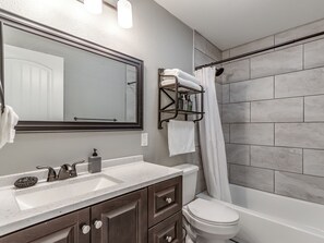 Combined shower/bathtub, hair dryer, towels, soap