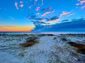 On the beach, sun-loungers, beach towels