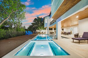 A heated pool - Tern Key - Luxury Canal-Front Home w/ Heated Pool, Spa, Dock & Near Bean Point (Anna Maria)