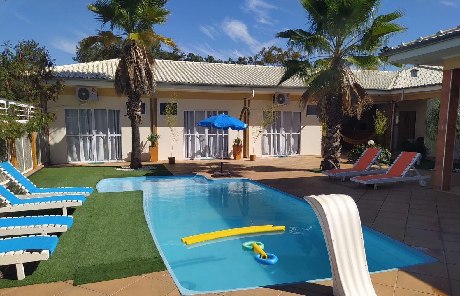 Outdoor pool, pool umbrellas, pool loungers
