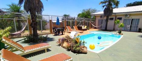 Outdoor pool, pool umbrellas, pool loungers