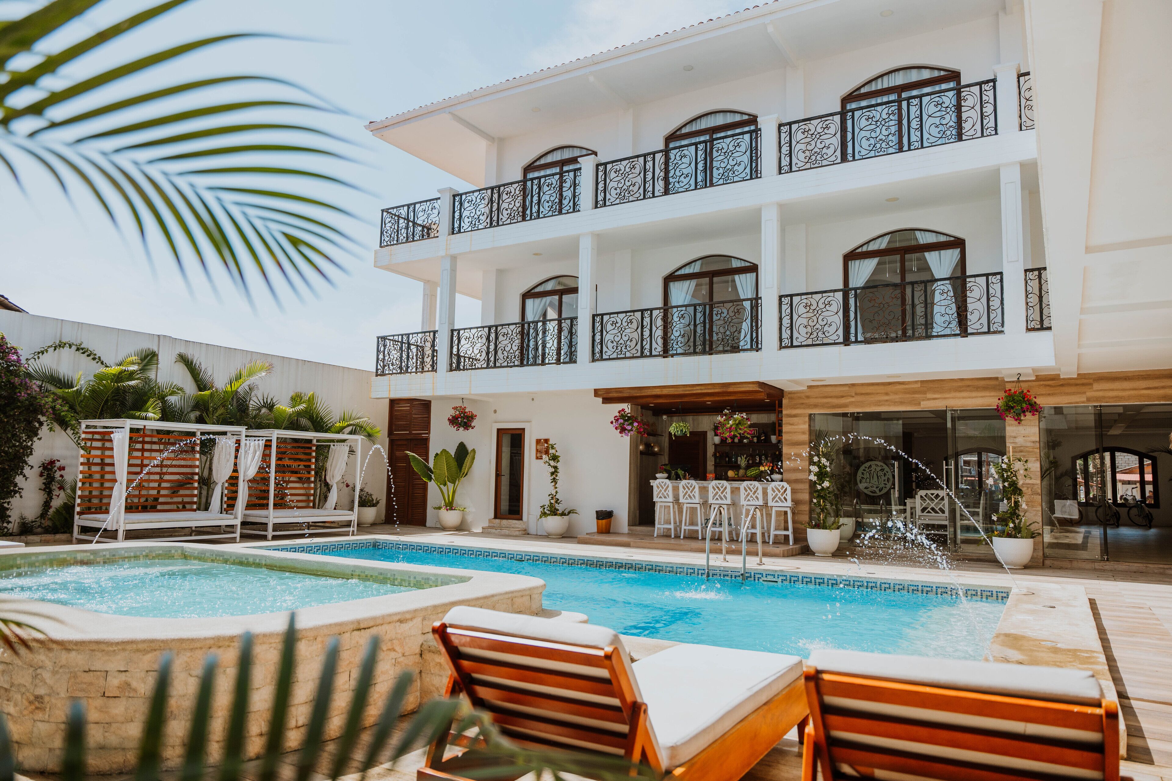 Outdoor pool, open 10:00 AM to 10:00 PM, free pool cabanas