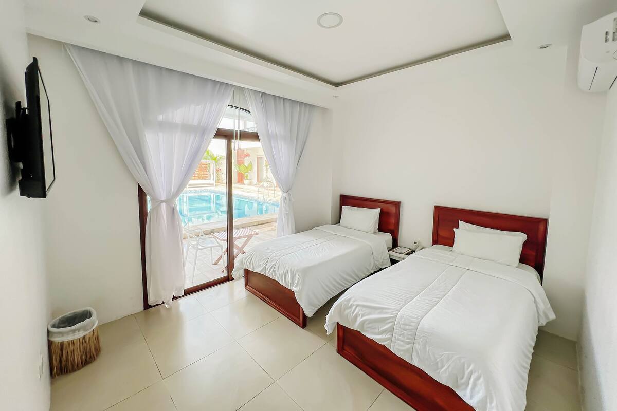 Phòng đôi Tiêu chuẩn | Bộ đồ giường cao cấp, nệm có lớp đệm bông, bàn ủi/dụng cụ ủi quần áo 