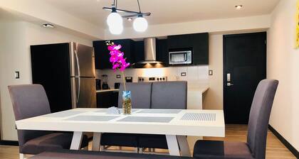 Apartamento en edificio completamente equipado para ideal para descanso.