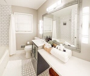 Combined shower/bathtub, hair dryer, towels, soap - In-Shower Sauna, Fenced Yard W/Deck & BBQ Near ATL (Atlanta)