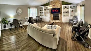 Smart TV, fireplace, books