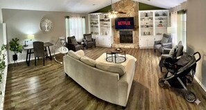 Smart TV, fireplace, books