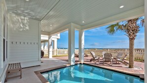A pool area with a clear view of the ocean, a wooden deck, and lounge chairs. - 🌅 16 Sunsets | Gulf Front | Private Pool | Free Sunset Dolphin Cruise | Beach Chair Service 🐬 (Miramar Beach)