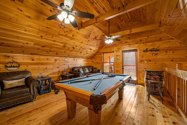 Loft/Game room with pool table and sleeper sofa