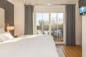 1 bedroom, in-room safe, WiFi, bed sheets - Modern 2-room apartment directly behind the Baltic Sea dike - Logierhaus Friedrich (Zingst)