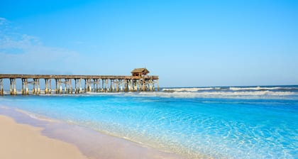 Wake to Waves, Watch Rockets Soar: Your Dreamy Oceanfront Condo Awaits
