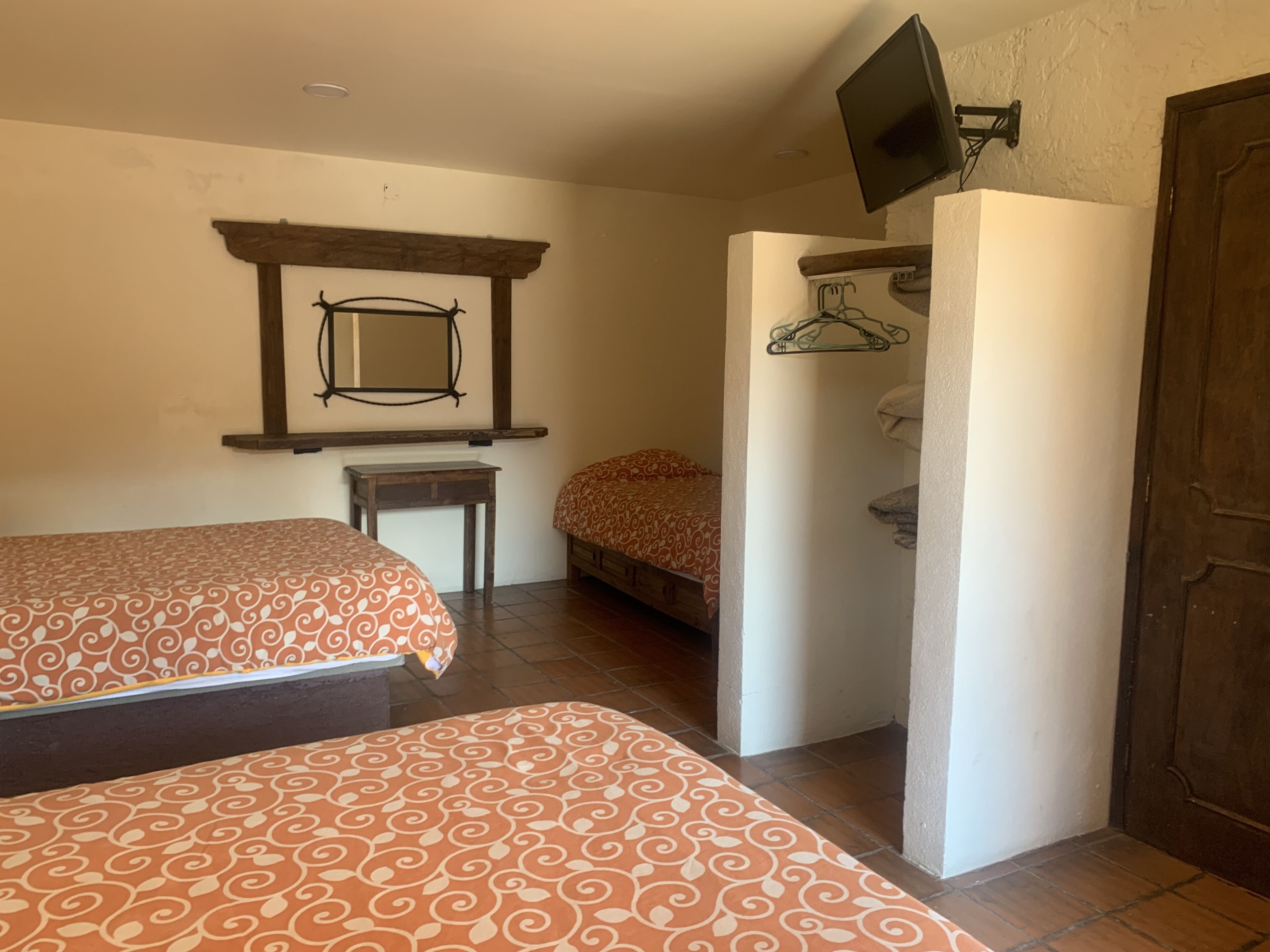 family room | 1 bedroom, down duvets, pillow-top beds, desk