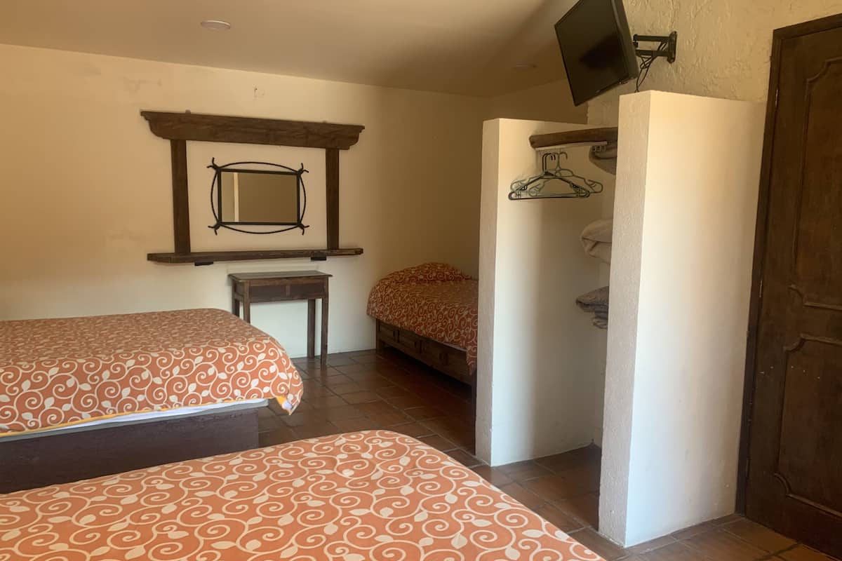 family room | 1 bedroom, down duvets, pillow-top beds, desk