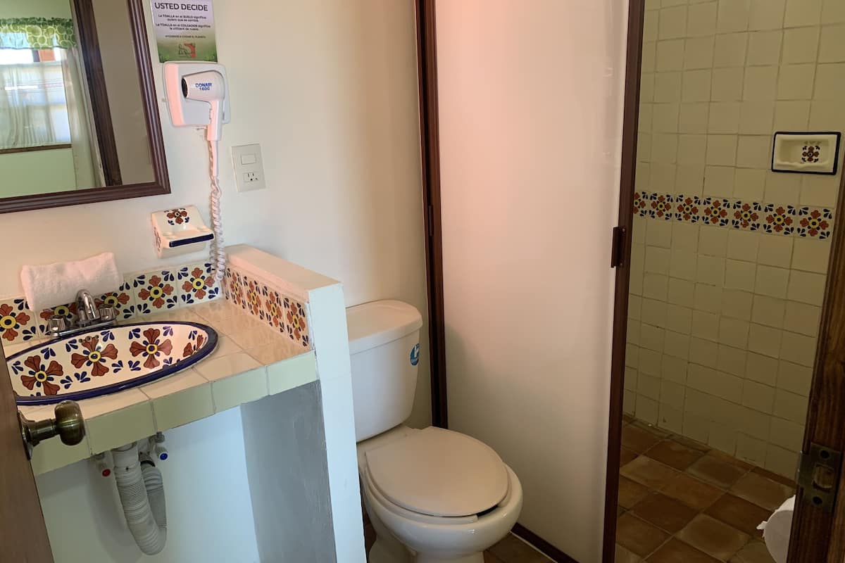 junior room | bathroom | shower, rainfall showerhead, hair dryer, towels