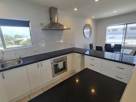 Apartment, 3 Bedrooms, Beachside | Private kitchen | Full-size fridge, microwave, stovetop, electric kettle