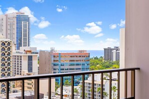 Enjoy stunning city views from the balcony of this high-rise building.