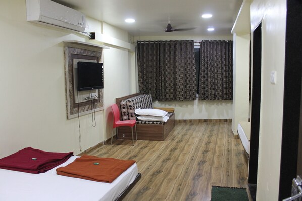 Family Twin Room, 3 Bedrooms | Desk, free WiFi, bed sheets - Hotel Mukesh residency (Pune)