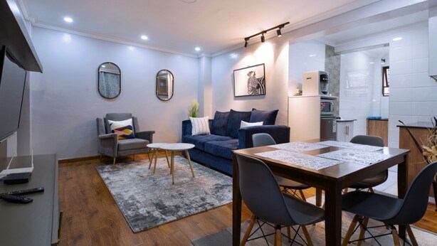 Apartment, 1 Bedroom | Living area | Flat-screen TV - Ruby Suites by Edmor Suites (Nairobi)