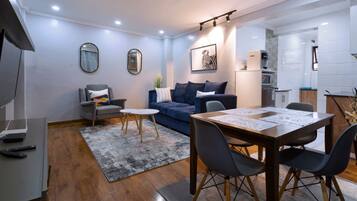 Apartment, 1 Bedroom | Living area | Flat-screen TV