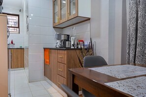 Apartment, 1 Bedroom | Private kitchen | Full-size fridge, microwave, oven, stovetop