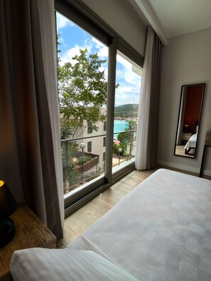 Standaard Twin kamer, 2 eenpersoonsbedden, gedeeltelijk uitzicht op zee, uitzicht op zee | Een minibar, gratis wifi, beddengoed