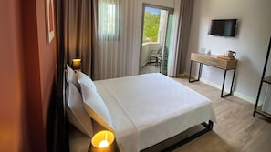 Chambre Standard, 1 lit double, vue sur le jardin | Minibar, accès au Wi-Fi (inclus), literie fournie