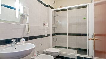 Shower, free toiletries, hair dryer, towels