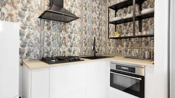 Fridge, stovetop, coffee/tea maker, cookware/dishes/utensils
