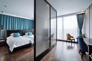 A modern hotel room with two beds, a desk, a chair, and large windows. - Puyuan X Hotel (Tongxiang)
