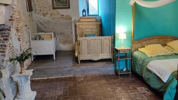 Deluxe-Vierbettzimmer | Hochwertige Bettwaren, Select-Comfort-Betten, individuell dekoriert