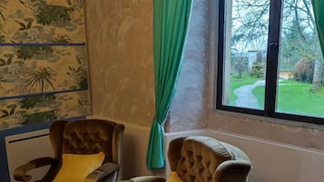 Deluxe Quadruple Room | Premium bedding, Select Comfort beds, individually decorated