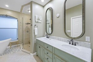 Bathtub, hair dryer, towels