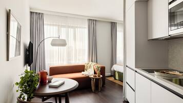 Studio Apartment | In-room safe, laptop workspace, blackout drapes, soundproofing