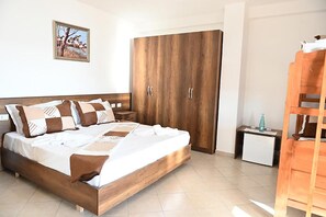 Family Room, Sea View | Desk, soundproofing, free WiFi, bed sheets