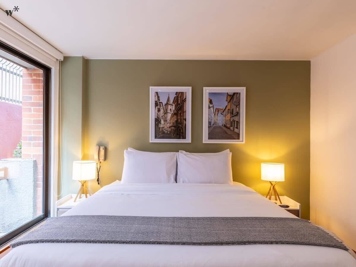 1 habitación, tabla de planchar con plancha, wifi y ropa de cama 