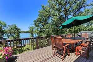 Outdoor dining - Spacious, Upscale Whitewater Lake Home |200+ Ft of Lake Frontage |Swim Deck |Docks |Screened Porch (Whitewater)