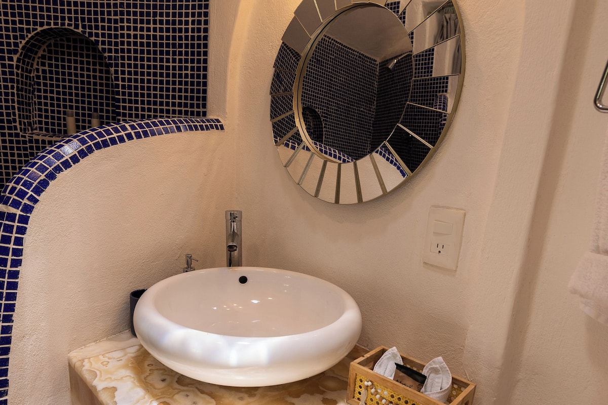 hair dryer, dressing gowns, slippers, towels