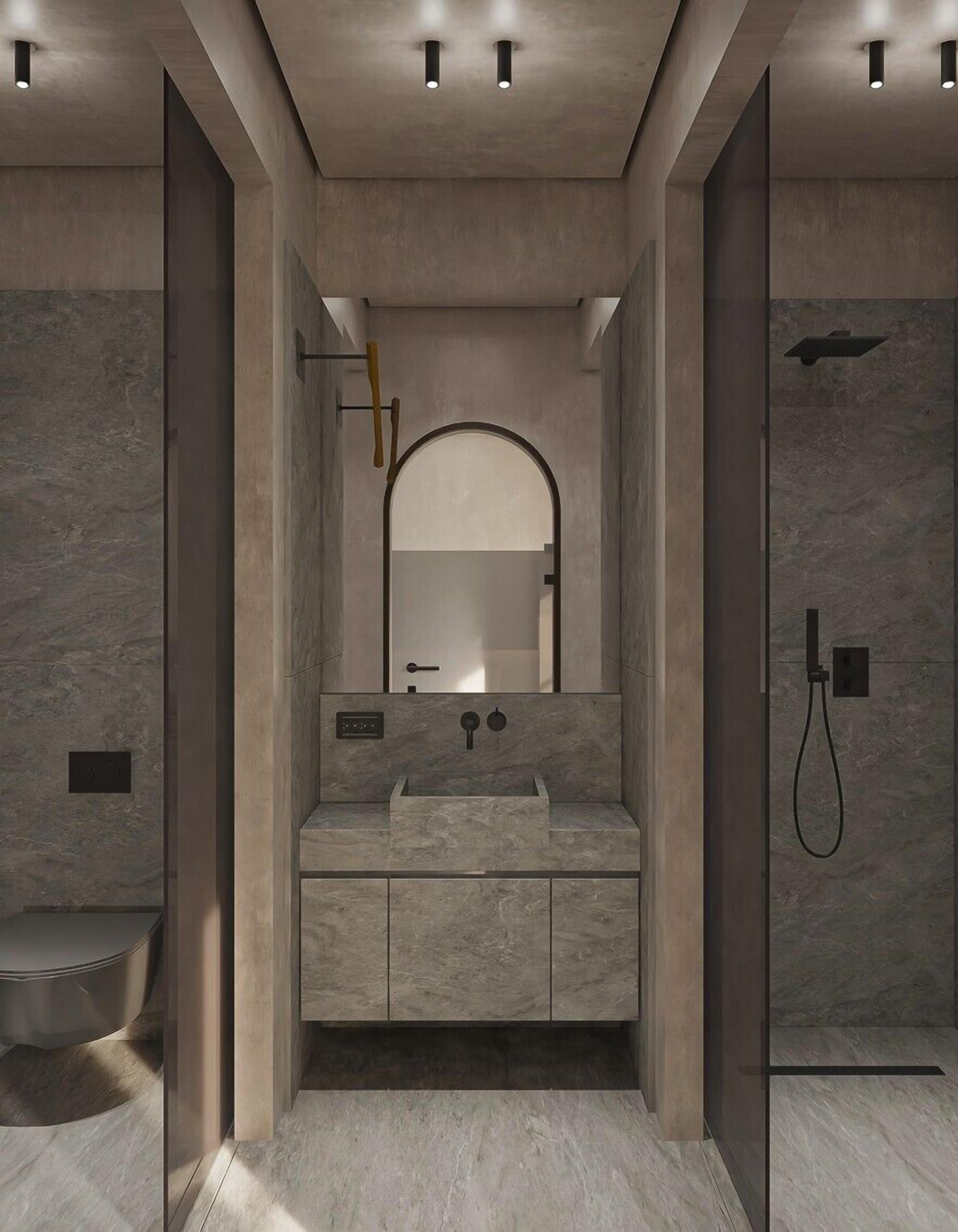 Een moderne badkamer met een grote spiegel, een wastafel en een douche.