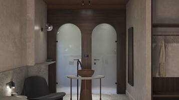 A modern bedroom with a bed, a small table with a bowl, a chair, and a wardrobe.