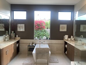 Bathtub, hair dryer, bidet, towels