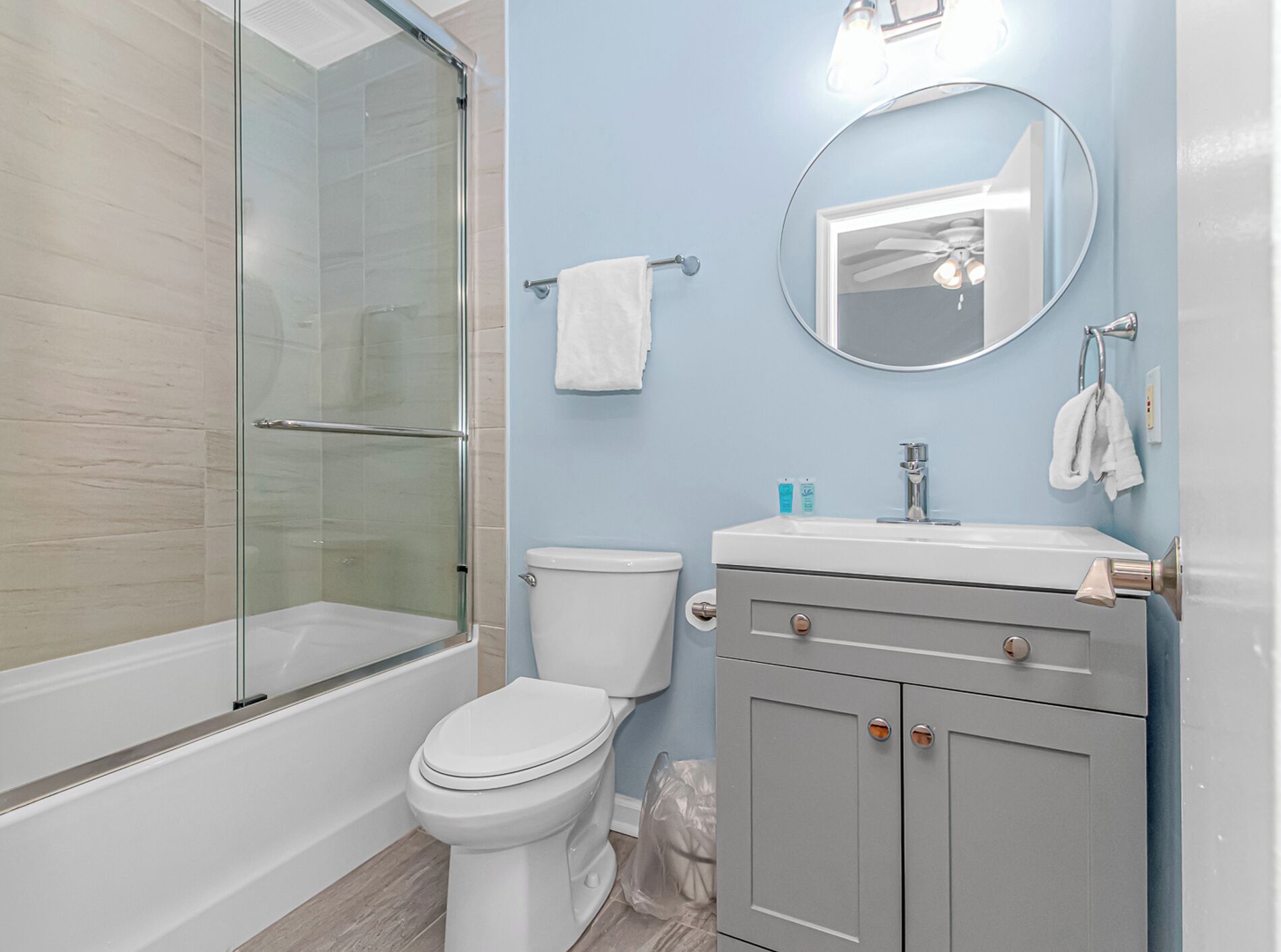 Combined shower/tub, hair dryer, towels, toilet paper