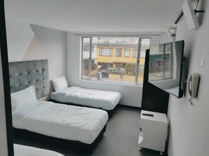 Quarto triplo | Wi-Fi de cortesia, roupa de cama