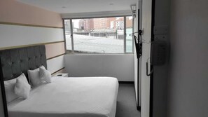 Quarto solteiro | Wi-Fi de cortesia, roupa de cama