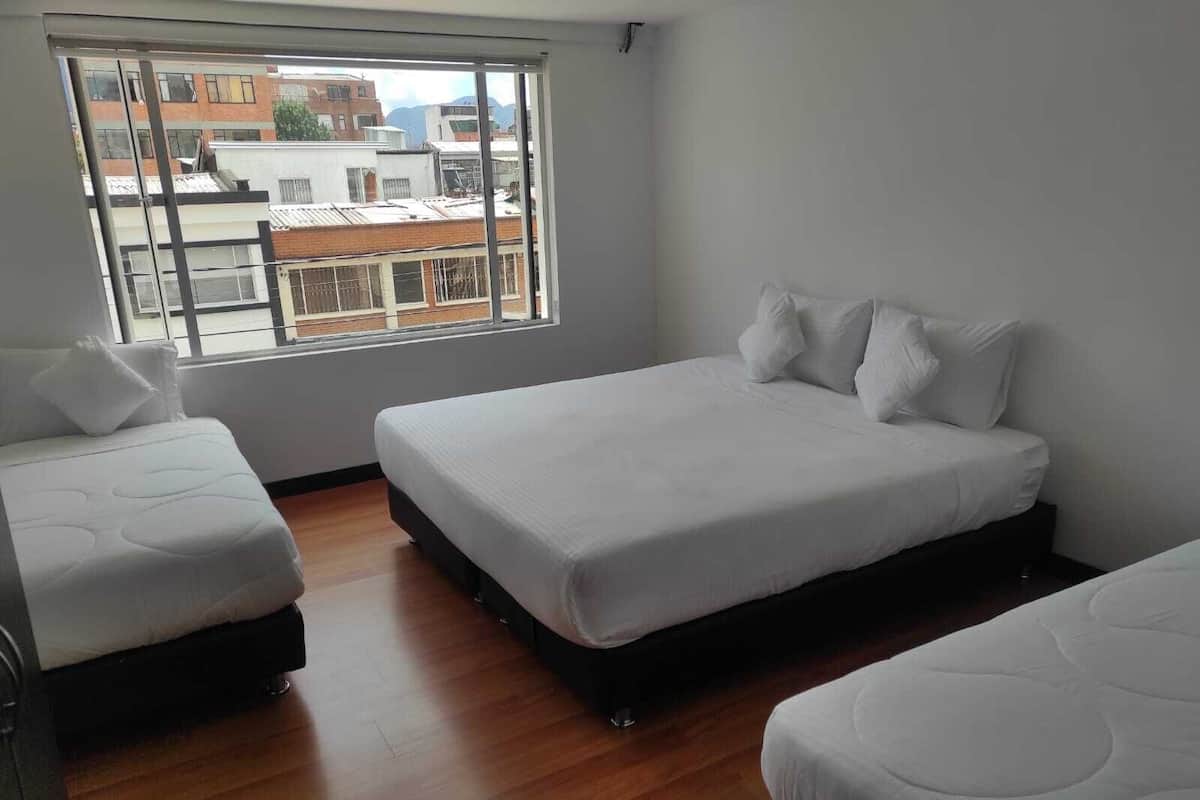 Basic Quadruple Room | Free WiFi, bed sheets