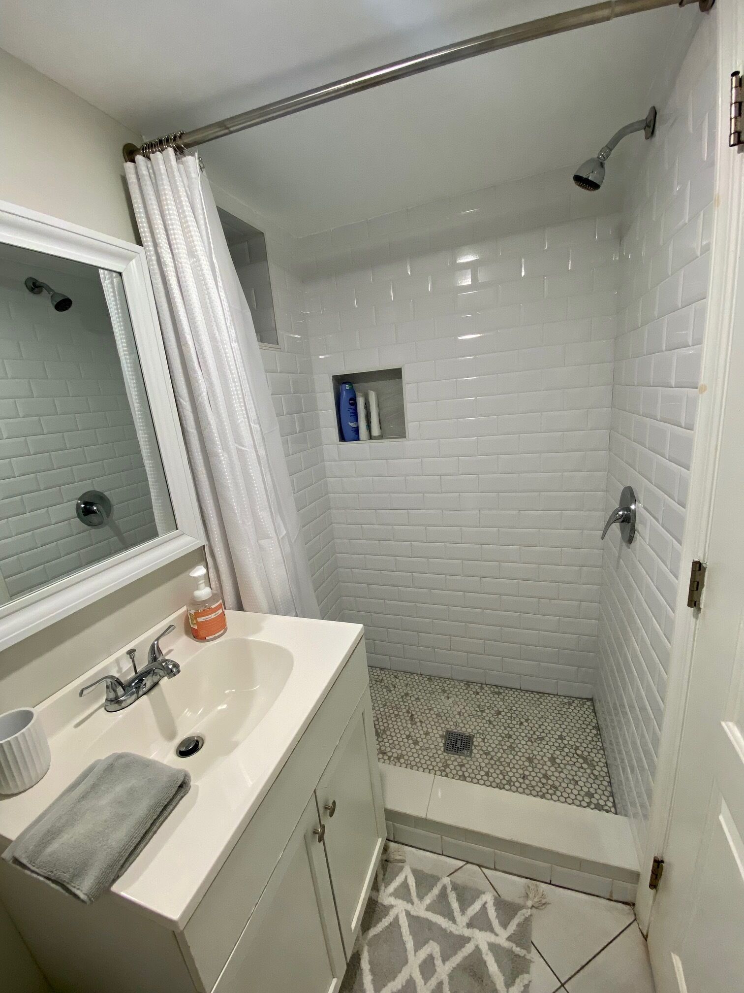 Combined shower/tub, hair dryer