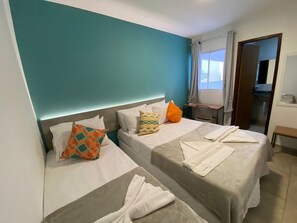 Triple Room, Side City View | Desk, laptop workspace, bed sheets - Pousada Mirante dos Corais (Ipojuca)